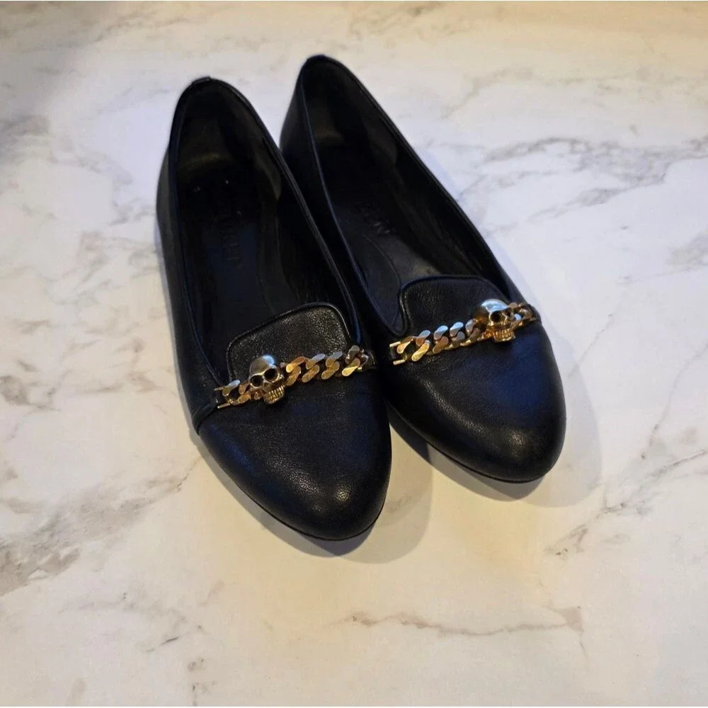 Alexander McQueen Black Leather Loafers with Gold Skull Detail